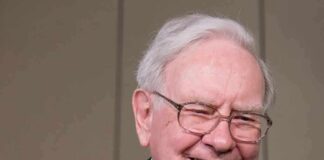 Warren Buffett smiling during a public appearance