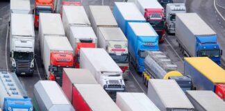Trucks in heavy traffic on a multi-lane highway