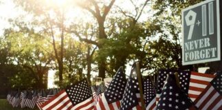 American flags displayed outdoors at a memorial