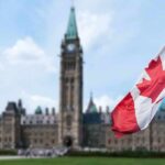 EU Throws Open Door To Canada Canadian flag with Parliament building in background