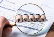 DEM CORRUPTION SCANDAL: Husband of Candidate ARRESTED! Magnifying glass highlighting wooden blocks spelling fraud on an invoice