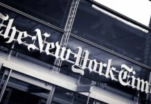 Trump Praises NYT For Latest Report- RARE! The New York Times sign on a glass building facade