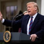 Trump Vows Senate Race Lawsuit Under One Condition Donald Trump speaking at a podium outdoors