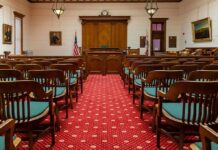 NFL Star’s Trial Drops Jaw-Dropping Claims Courtroom with wooden benches facing the judge's bench