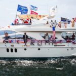 Trump Wants To Rename This Ocean Stephen Paea on a decorated yacht with American flags during a boat parade