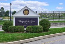 Judge Goes Berserk After Trump CHOPPED Over 500 Trees at Golf Course Entrance sign at a golf course with manicured shrubs