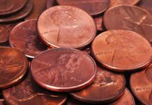 pile of copper pennies with heads side up