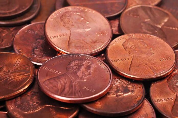 pile of copper pennies with heads side up