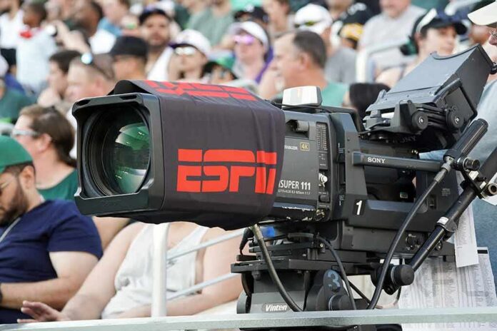 shutterstock_2270934849 Broadcast television camera at a sports event