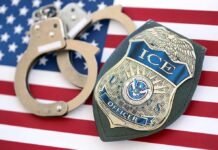 Man Arrested for Posing as ICE Agent at Polling Station ICE officer badge and handcuffs on an American flag
