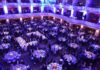 Trump Crashes Fox News Stars Wedding Ballroom filled with round tables at a formal gala dinner