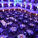 Trump Crashes Fox News Stars Wedding Ballroom filled with round tables at a formal gala dinner
