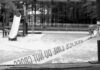 Playground closed off with caution tape in black and white