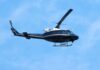 Runway Scare: Second Lady Stumbles With Newborn Helicopter flying against a blue sky