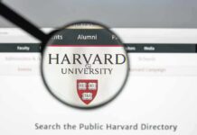 Harvard Underfire For Controversial Hiring Practice Magnifying glass highlighting Harvard University website header